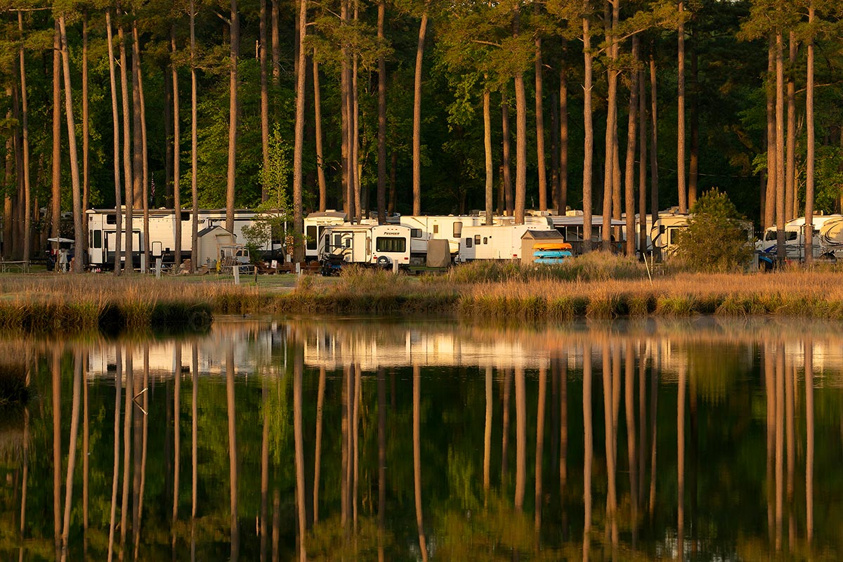 Camp Cardinal RV camper reflections in the water