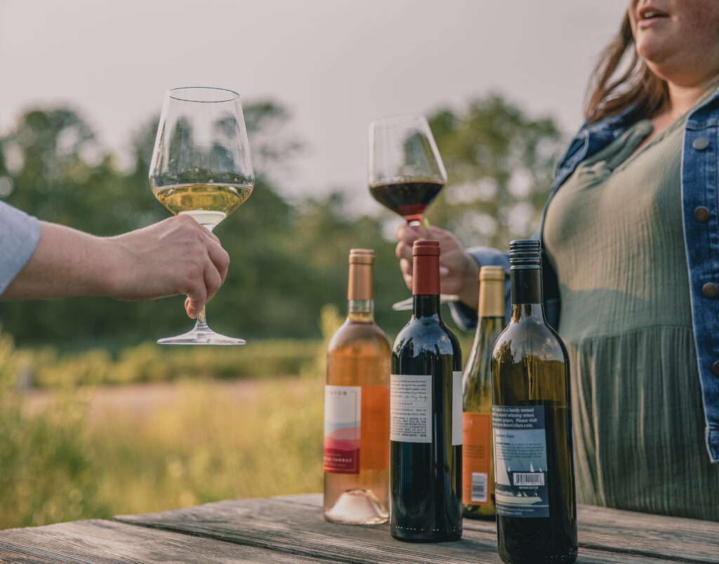 Wine and conversation shared under string lights at Camp Cardinal.